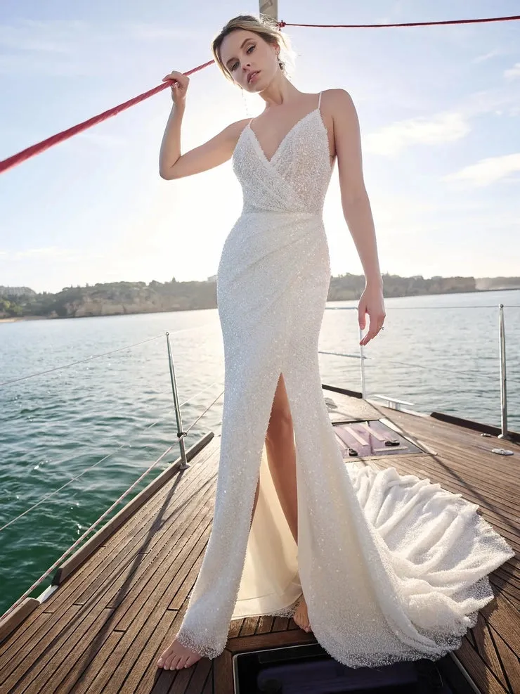 Sexy beaded wedding gown with a plunging V-neck